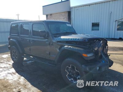 Czwarte zdjęcie samochodu z boku: 2022 JEEP WRANGLER UNLIMITED RUBICON 4XE VIN:1C4JJXR66NW238909 - miniatura