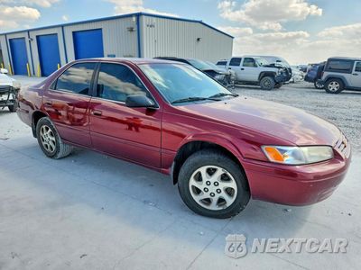 Czwarte zdjęcie samochodu z boku: 1999 TOYOTA CAMRY XLE V6 VIN:JT2BF28K0X0147740 - miniatura