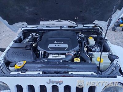 Zdjęcie 12 z 14 samochodu: 2015 JEEP WRANGLER UNLIMITED SAHARA VIN:1C4BJWEGXFL672878 - miniatura