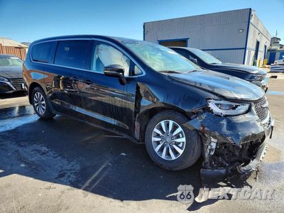 Czwarte zdjęcie samochodu z boku: 2023 CHRYSLER PACIFICA HYBRID TOURING L VIN:2C4RC1L74PR632562 - miniatura