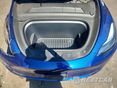 Zdjęcie 11 z 12 samochodu: 2024 TESLA MODEL Y VIN:7SAYGAEE9RF981651 - miniatura