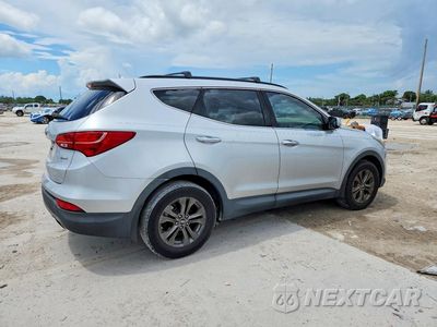Trzecie zdjęcie samochodu z tyłu: 2014 HYUNDAI SANTA FE SPORT 2.4L VIN:5XYZU3LB7EG206928 - miniatura