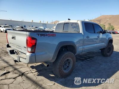 Trzecie zdjęcie samochodu z tyłu: 2019 TOYOTA TACOMA TRD OFF-ROAD VIN:3TMDZ5BNXKM066908 - miniatura