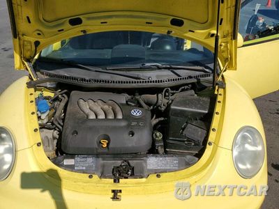 Zdjęcie 11 z 12 samochodu: 1999 VOLKSWAGEN NEW BEETLE GLS VIN:3VWCC21C2XM475064 - miniatura