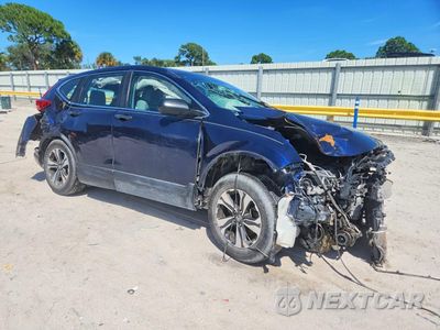 Czwarte zdjęcie samochodu z boku: 2017 HONDA CR-V LX VIN:5J6RW5H34HL003473 - miniatura