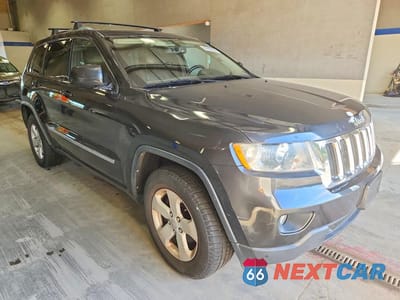 Czwarte zdjęcie samochodu z boku: 2011 JEEP GRAND CHEROKEE LAREDO VIN:1J4RR4GT9BC643138 - miniatura