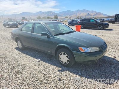 Czwarte zdjęcie samochodu z boku: 1999 TOYOTA CAMRY CE VIN:4T1BG22KXXU869069 - miniatura