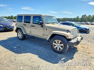 Czwarte zdjęcie samochodu z boku: 2017 JEEP WRANGLER UNLIMITED SAHARA VIN:1C4HJWEG5HL605716 - miniatura