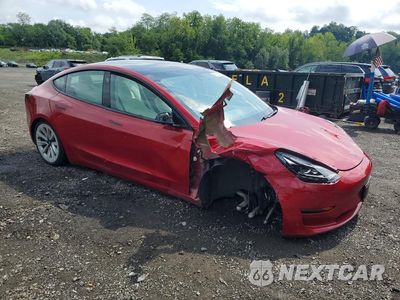 Czwarte zdjęcie samochodu z boku: 2021 TESLA MODEL 3 VIN:5YJ3E1EB1MF015631 - miniatura
