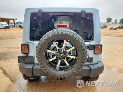 Zdjęcie 6 z 13 samochodu: 2012 JEEP WRANGLER UNLIMITED SAHARA VIN:1C4BJWEG6CL148655 - miniatura