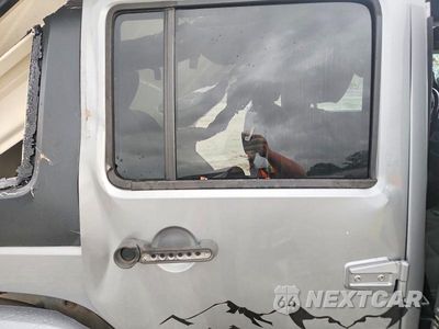Zdjęcie 11 z 13 samochodu: 2013 JEEP WRANGLER UNLIMITED SAHARA VIN:1C4BJWEG3DL648970 - miniatura