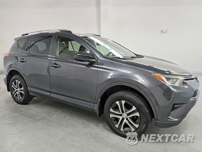 Czwarte zdjęcie samochodu z boku: 2018 TOYOTA RAV4 LE VIN:JTMBFREV7JJ237919 - miniatura