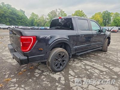 Trzecie zdjęcie samochodu z tyłu: 2023 FORD F150 SUPERCREW VIN:1FTFW1E53PFA49932 - miniatura