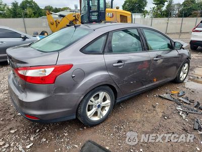 Trzecie zdjęcie samochodu z tyłu: 2014 FORD FOCUS SE VIN:1FADP3F21EL189356 - miniatura