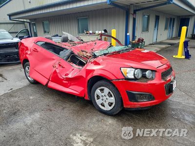 Czwarte zdjęcie samochodu z boku: 2014 CHEVROLET SONIC LS VIN:1G1JA5SGXE4155513 - miniatura