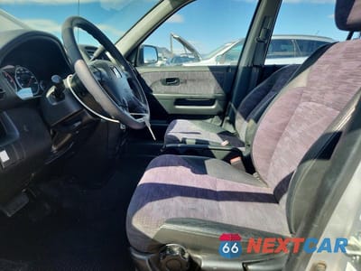 Zdjęcie 7 z 13 samochodu: 2002 HONDA CR-V LX VIN:JHLRD684X2C002459 - miniatura