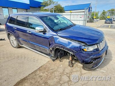 Czwarte zdjęcie samochodu z boku: 2018 JEEP GRAND CHEROKEE SUMMIT VIN:1C4RJFJG5JC409677 - miniatura