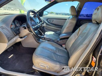 Zdjęcie 7 z 12 samochodu: 2000 NISSAN MAXIMA GXE VIN:JN1CA31A0YT016313 - miniatura