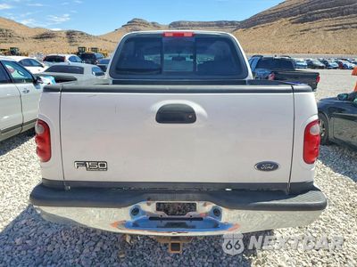 Zdjęcie 6 z 12 samochodu: 2002 FORD F150 SUPERCREW VIN:1FTRW08L42KE28813 - miniatura