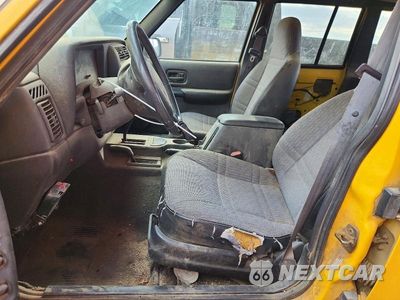 Zdjęcie 7 z 13 samochodu: 2001 JEEP CHEROKEE SPORT VIN:1J4FF48S91L584088 - miniatura