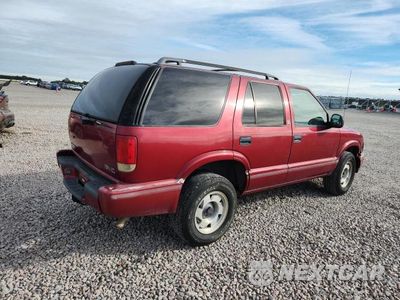 Trzecie zdjęcie samochodu z tyłu: 1998 GMC JIMMY VIN:1GKCS13W7W2552724 - miniatura