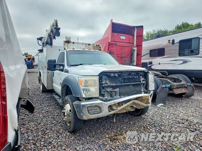 Czwarte zdjęcie samochodu z boku: 2014 FORD F550 SUPER DUTY VIN:1FDUF5HT6EEA85928 - miniatura
