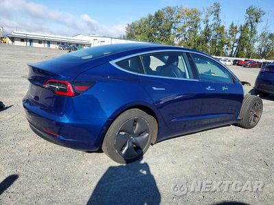 Trzecie zdjęcie samochodu z tyłu: 2018 TESLA MODEL 3 VIN:5YJ3E1EA9JF059055 - miniatura