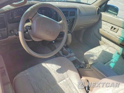 Zdjęcie 8 z 12 samochodu: 1999 TOYOTA TACOMA XTRACAB PRERUNNER VIN:4TASN92N2XZ551409 - miniatura