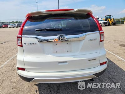 Zdjęcie 6 z 13 samochodu: 2015 HONDA CR-V TOURING VIN:5J6RM4H92FL093935 - miniatura