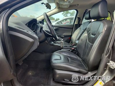 Zdjęcie 7 z 12 samochodu: 2016 FORD FOCUS TITANIUM VIN:1FADP3N25GL400756 - miniatura