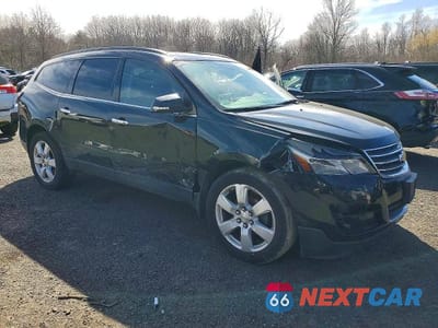 Czwarte zdjęcie samochodu z boku: 2017 CHEVROLET TRAVERSE LT VIN:1GNKVGKD2HJ295991 - miniatura