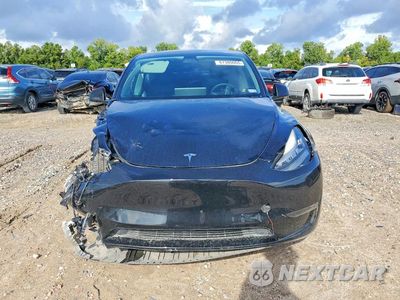 Piąte zdjęcie samochodu w środku: 2021 TESLA MODEL Y VIN:5YJYGDED2MF114056 - miniatura