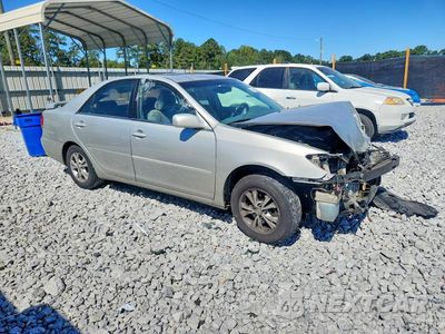 Czwarte zdjęcie samochodu z boku: 2004 TOYOTA CAMRY LE V6 VIN:4T1BF32K94U069772 - miniatura