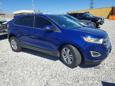 Czwarte zdjęcie samochodu z boku: 2015 FORD EDGE SEL VIN:2FMTK3J98FBB81549 - miniatura