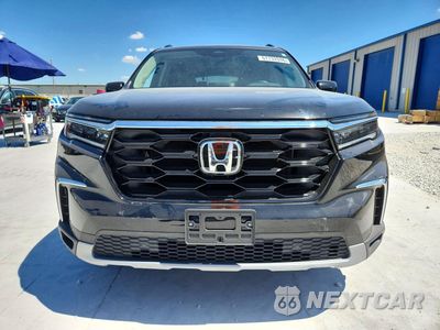Piąte zdjęcie samochodu w środku: 2024 HONDA PILOT TOURING VIN:5FNYG2H71RB012491 - miniatura