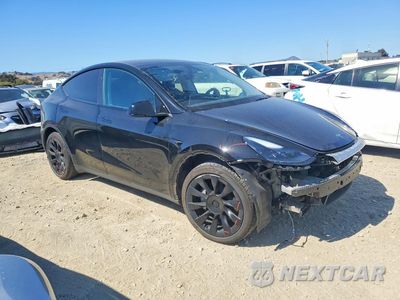 Czwarte zdjęcie samochodu z boku: 2023 TESLA MODEL Y VIN:7SAYGDEE6PF922944 - miniatura