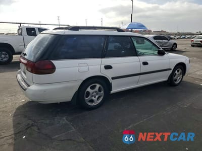 Trzecie zdjęcie samochodu z tyłu: 1995 SUBARU LEGACY L VIN:4S3BK6354S7343014 - miniatura
