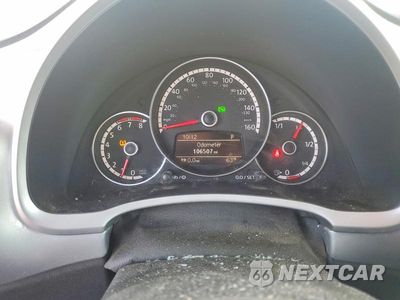 Zdjęcie 9 z 12 samochodu: 2014 VOLKSWAGEN BEETLE VIN:3VWJ17AT1EM637760 - miniatura