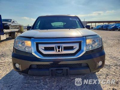 Piąte zdjęcie samochodu w środku: 2010 HONDA PILOT EXL VIN:5FNYF3H55AB017866 - miniatura