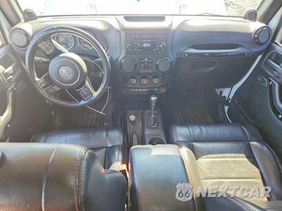 Zdjęcie 8 z 12 samochodu: 2012 JEEP WRANGLER UNLIMITED SAHARA VIN:1C4BJWEG4CL263559 - miniatura