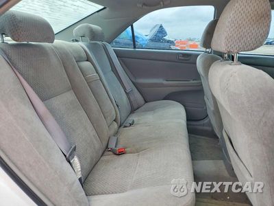Zdjęcie 10 z 13 samochodu: 2003 TOYOTA CAMRY LE VIN:4T1BE32K83U245017 - miniatura