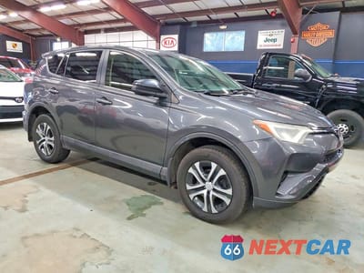 Czwarte zdjęcie samochodu z boku: 2018 TOYOTA RAV4 LE VIN:JTMBFREV4JJ737584 - miniatura