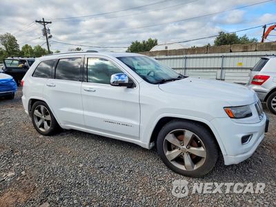 Czwarte zdjęcie samochodu z boku: 2014 JEEP GRAND CHEROKEE VIN:1C4RJFCG6EC169865 - miniatura
