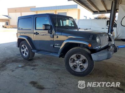 Czwarte zdjęcie samochodu z boku: 2017 JEEP WRANGLER SAHARA VIN:1C4AJWBG2HL507572 - miniatura