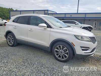 Czwarte zdjęcie samochodu z boku: 2017 LINCOLN MKC SELECT VIN:5LMCJ2D94HUL15413 - miniatura