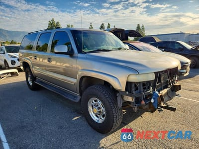 Czwarte zdjęcie samochodu z boku: 2003 CHEVROLET SUBURBAN K2500 VIN:3GNGK26U53G222166 - miniatura