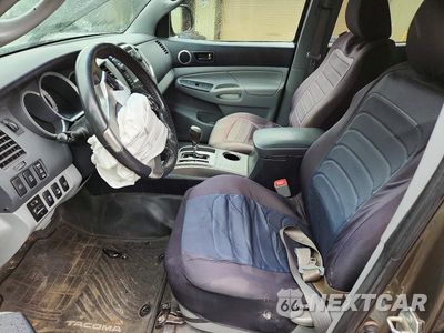 Zdjęcie 7 z 12 samochodu: 2013 TOYOTA TACOMA V6 VIN:3TMLU4EN1DM116467 - miniatura