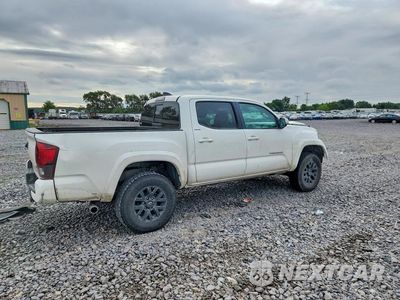 Trzecie zdjęcie samochodu z tyłu: 2023 TOYOTA TACOMA DOUBLE CAB LONG BED VIN:3TMCZ5AN2PM615909 - miniatura