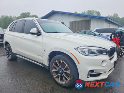 Czwarte zdjęcie samochodu z boku: 2018 BMW X5 XDR40E VIN:5UXKT0C56J0W00500 - miniatura