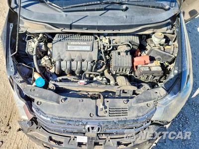 Zdjęcie 11 z 12 samochodu: 2010 HONDA INSIGHT LX VIN:JHMZE2H5XAS016473 - miniatura